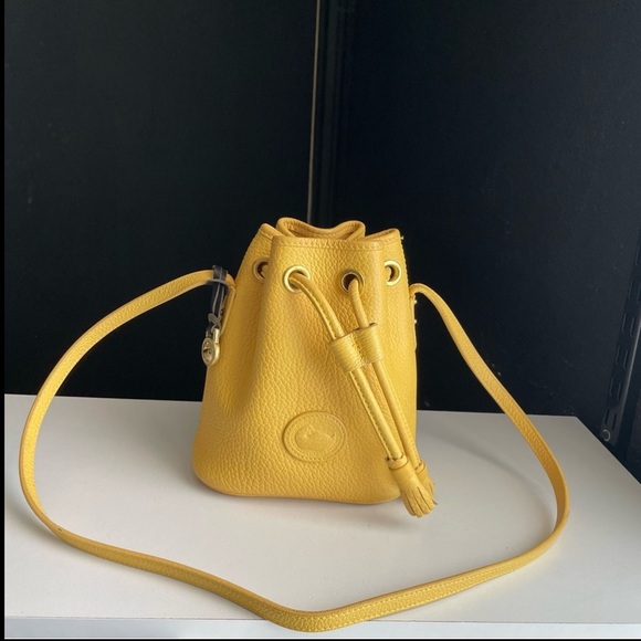 Dooney and Bourke AWL leather Palomino Yellow mini drawstring bucket bag purse - Picture 4 of 16